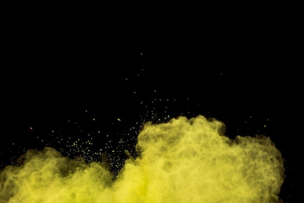 Nuage de poudre jaune curling coloré Photo gratuit
