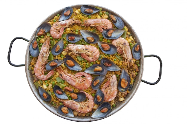 Paella Cuisine Espagnole Typique Avec De La Viande De Legumes De Fruits De Mer Et Du Riz Photo Premium