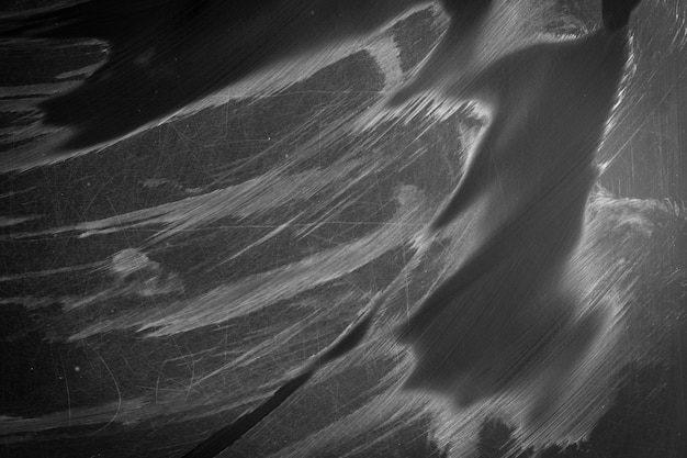 Surface de tableau noir avec rayures et traces de craie mouillée Photo Premium