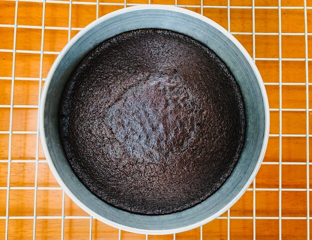 Vue De Dessus Du Gateau Rond Au Chocolat Noir Cuit Au Four Photo Premium