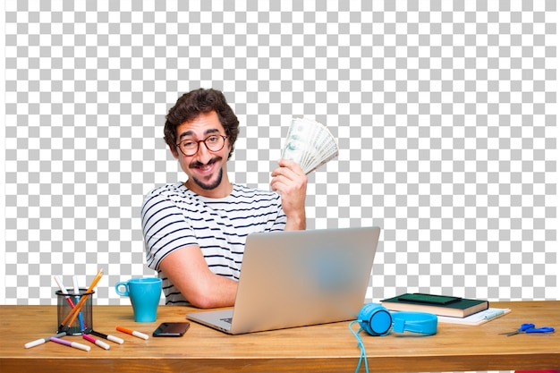 Giovane grafico pazzo su una scrivania con un concetto di laptop e paga, acquisto o denaro Psd Premium