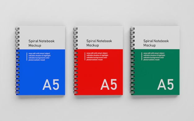 Klaar om te gebruiken triple bussiness hard cover a5 spiraal binder notepad mock up ontwerpsjabloon in bovenaanzicht Premium Psd