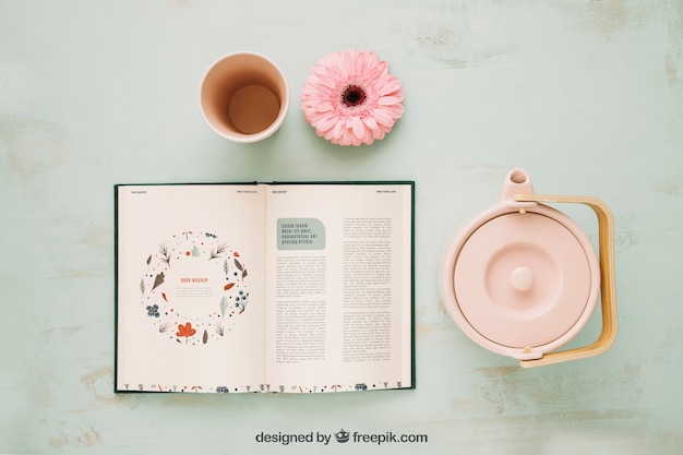 Download Mockup con concepto de primavera con libro abierto y café ...