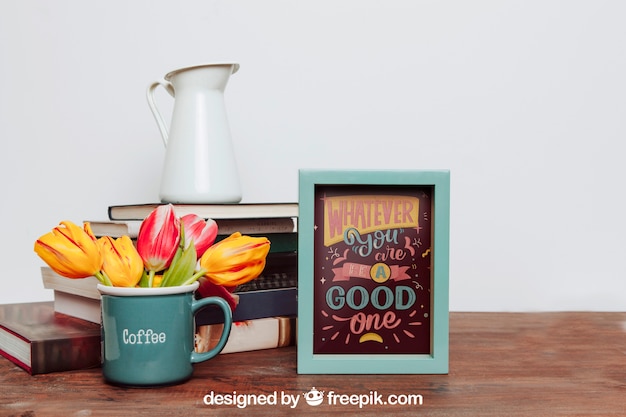 Download Mockup de marco al lado de flores en taza | Archivo PSD Gratis