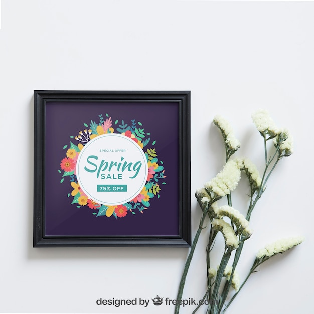 Download Mockup de primavera con marco al lado de flores blancas | Archivo PSD Gratis