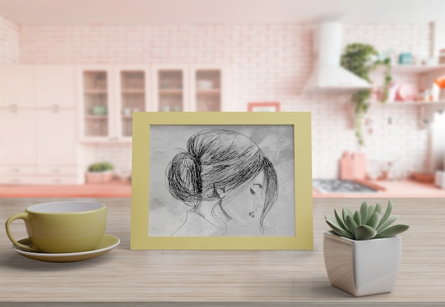 Modello di cornice decorativa sul tavolo a casa Psd Gratuite
