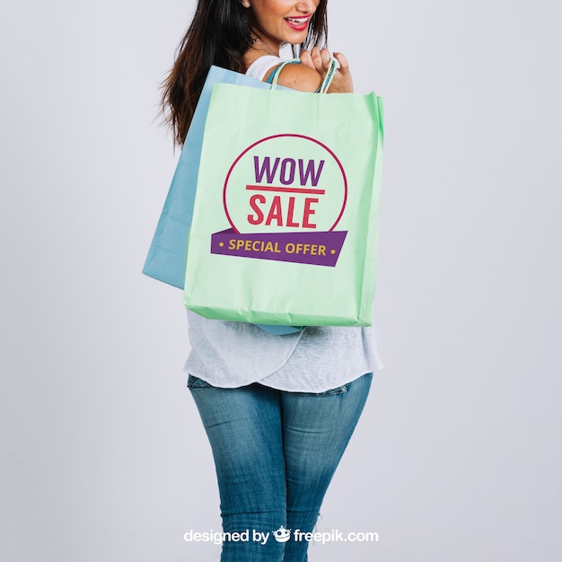 Download Shopping bag mockup con donna | Scaricare PSD gratis
