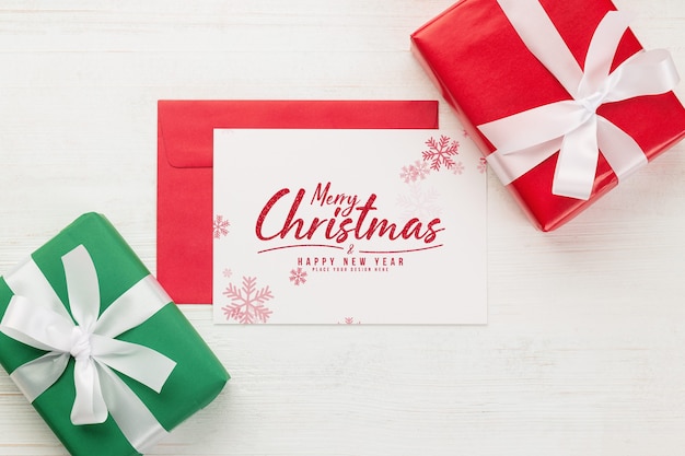 Carte De Voeux Joyeux Noel Et Maquette D Enveloppe Avec Boite Cadeau Psd Premium