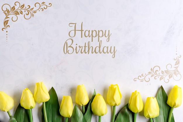 Fleurs De Tulipe Jaune Joyeux Anniversaire Sur Fond De Pierre Mise A Plat Avec Espace Copie Psd Premium