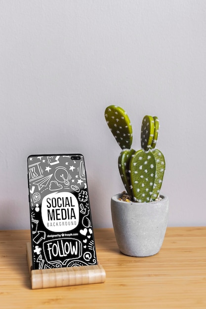 Maquette de téléphone avec le concept de médias sociaux Psd gratuit