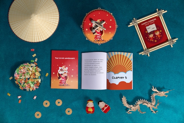 Vue de dessus décoration du nouvel an chinois et livres Psd gratuit