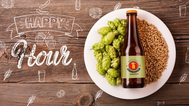 Garrafa de cerveja no prato com mock-up de sementes Psd grátis