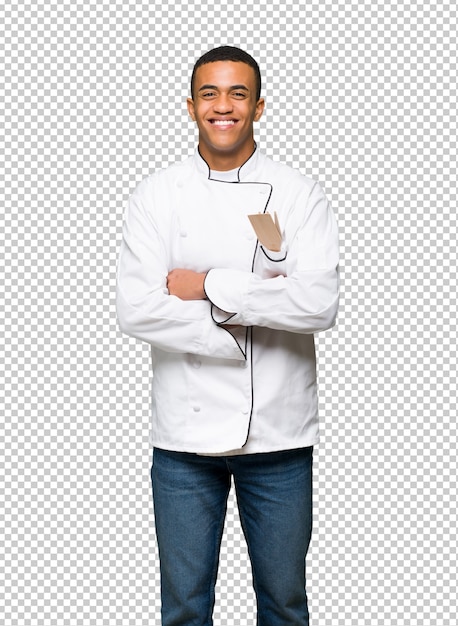 Jovem afro americano chef homem feliz e sorridente Psd Premium
