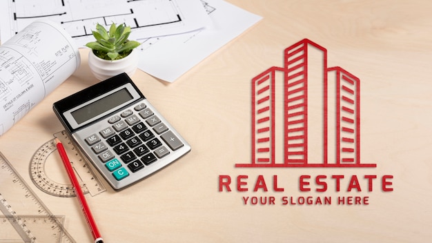 Logotipo imobiliário com calculadora Psd grátis