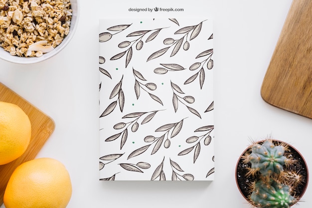 Download Mockup de capa de livro com grapefruits e cactus | PSD Grátis