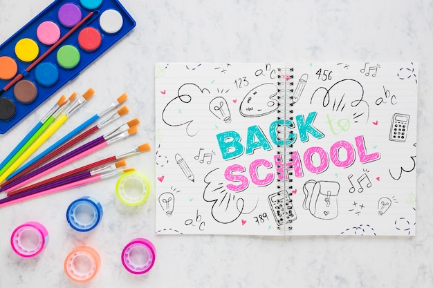 Voltar para itens de escola com aquarelas Psd grátis