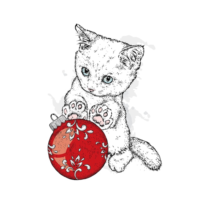 Beau Chaton Et Boule De Noel Vecteur Premium