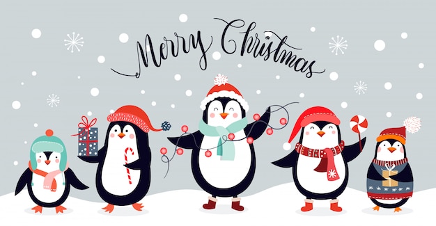 Carte de noël avec des pingouins mignons isolés sur un fond d'hiver Vecteur Premium