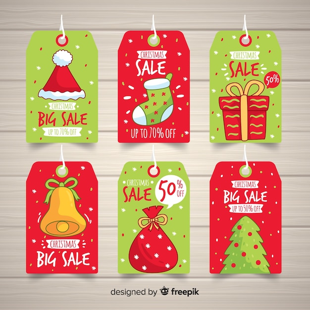Collection d'étiquettes de vente de noël Vecteur gratuit