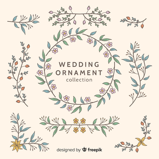 Collection d'ornements de mariage dessinés à la main Vecteur gratuit