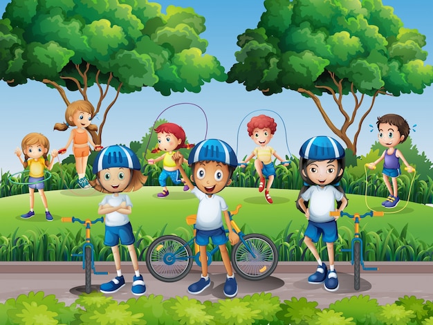 Enfants faisant de l'exercice dans le parc Vecteur gratuit