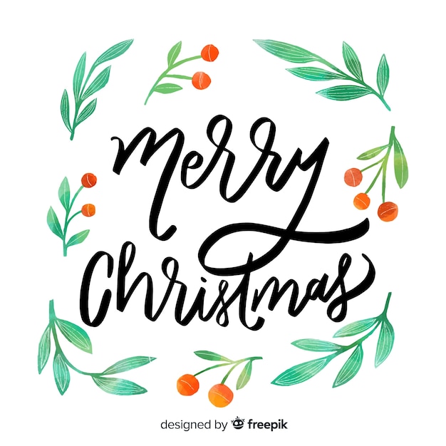 Joyeux noël lettrage avec gui Vecteur gratuit