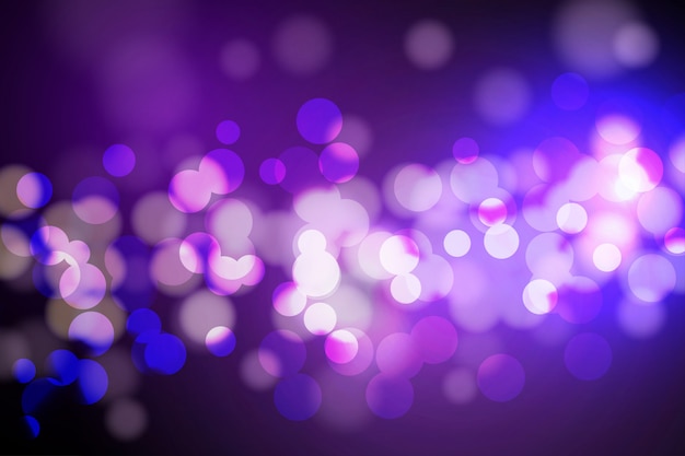 Lumières de bokeh et fond de paillettes Vecteur Premium