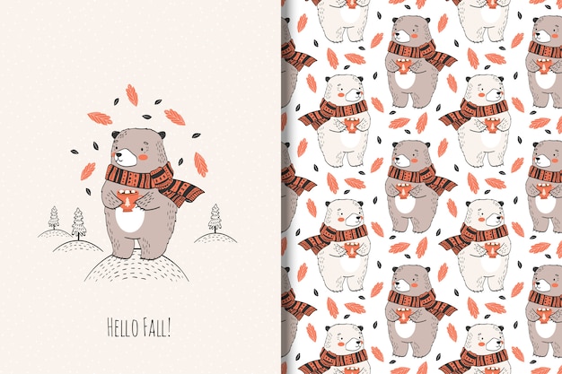 Main dessinée ours mignon avec une tasse. illustration animale automne. Vecteur Premium