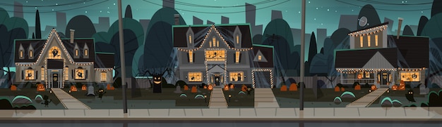 Maisons décorées pour halloween, vue de face avec différentes citrouilles Vecteur Premium