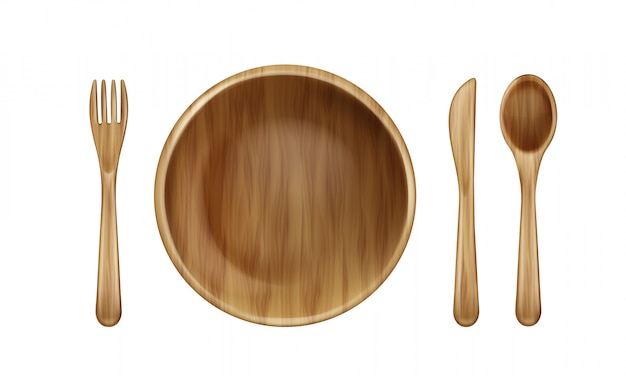 Plaque en bois, fourchette, cuillère et couteau vue de dessus. Vecteur gratuit