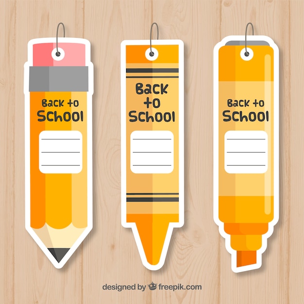 Retour aux étiquettes de l'école dans le style de crayon Vecteur gratuit