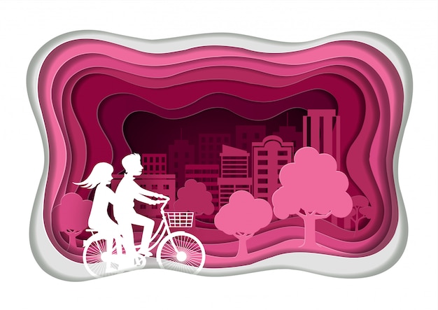 Style d'art de papier. les amoureux des hommes et des femmes font du vélo. dans le parc public rose Vecteur Premium