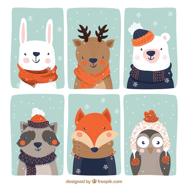 Vector Gratis | Colección de seis bonitos animales con ropa de invierno