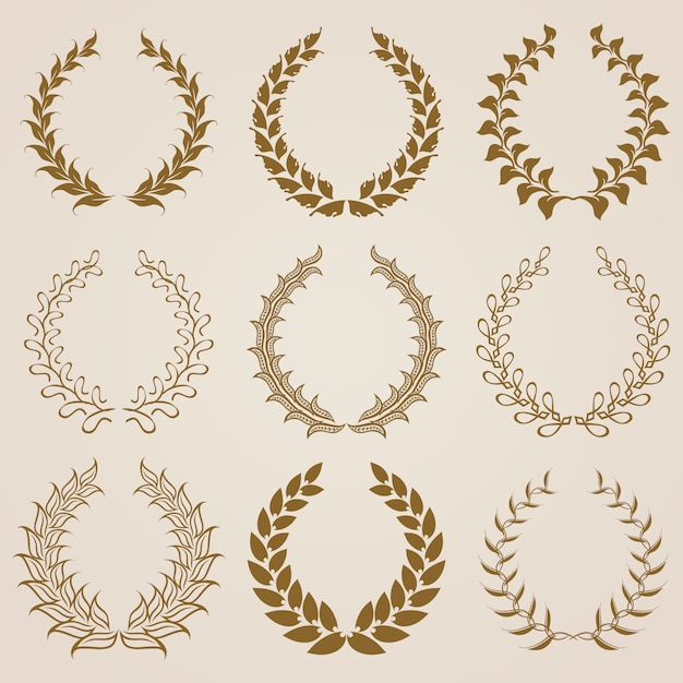 Conjunto de coronas de laurel de oro vector. Vector Premium