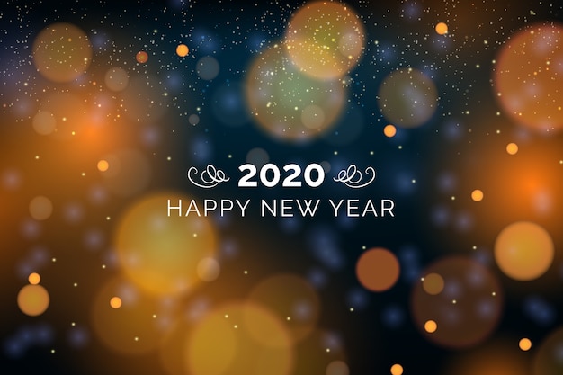 Fondo borroso año nuevo 2020 vector gratuito