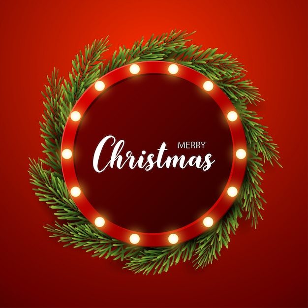Fondo de navidad con ramas de abeto, signo de luz sobre fondo rojo Vector Premium