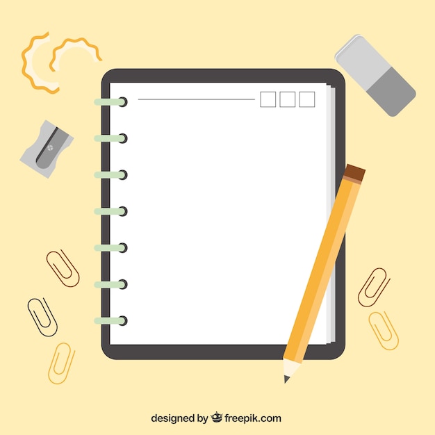 Libreta con accesorios en diseño plano Vector Gratis