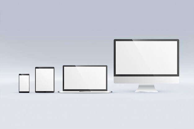 Maqueta del monitor de la computadora portátil, tableta y teléfono inteligente vector gratuito