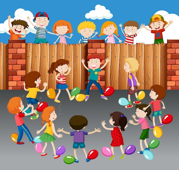 Niños jugando globos en la calle | Descargar Vectores Premium