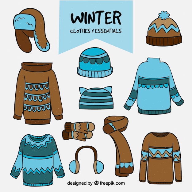 Ropa e imprescindibles de invierno dibujados a mano | Vector Gratis