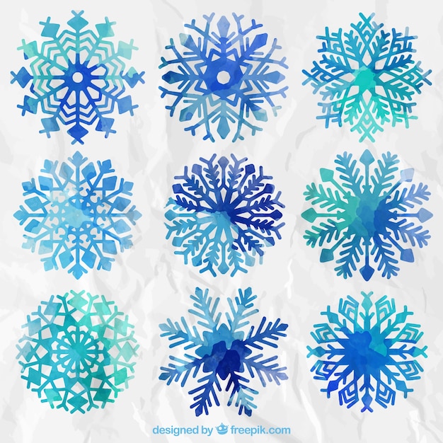 Set De Copos De Nieve De Acuarela Vector Gratis