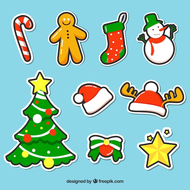 Set de pegatinas navideñas dibujadas a mano Vector Gratis