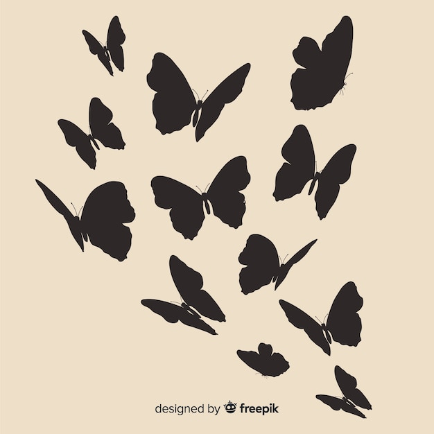 Siluetas De Mariposas Volando Vector Gratis