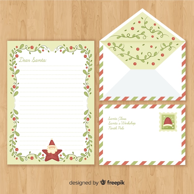 Sobre y carta de navidad en estilo dibujo a mano | Vector Gratis