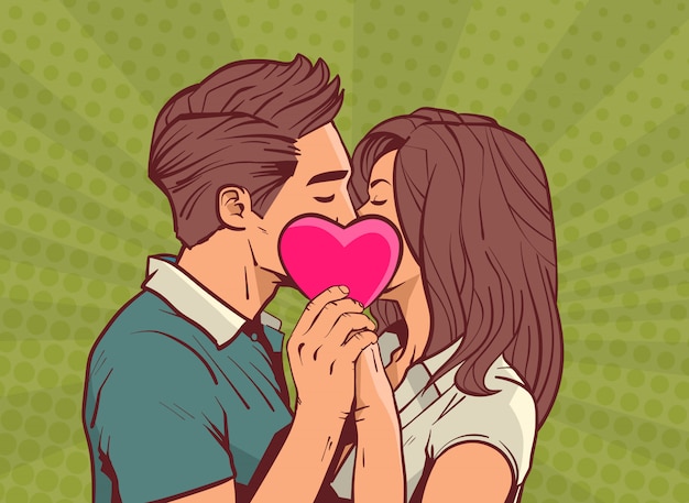 Junge paare, die rosa herz-mann und verliebte frau über komischem pop-art style valentine day celebration concept halten küssen Premium Vektoren