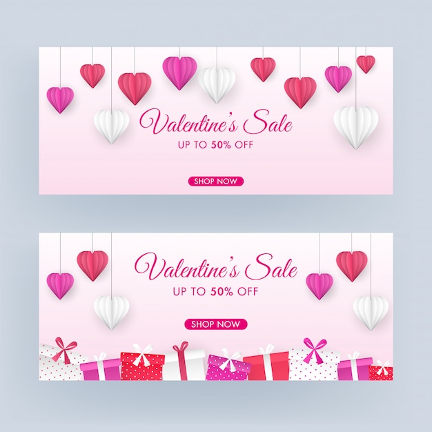 Valentinstag-verkaufs-titel oder fahnen-design-satz mit 50% rabattangebot, origami-papierschnitt-herzen hängen und die geschenkboxen, die auf rosa hintergrund verziert werden. Premium Vektoren