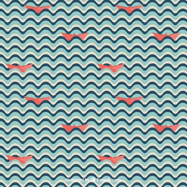 Wellen-muster mit einem roten boot papier | Kostenlose Vektor