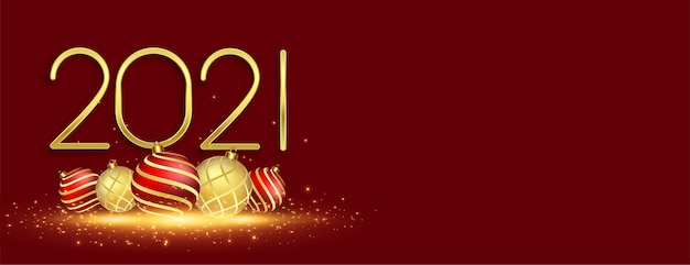 Banner de celebração do ano novo 2021 com bolas de natal | Vetor Grátis