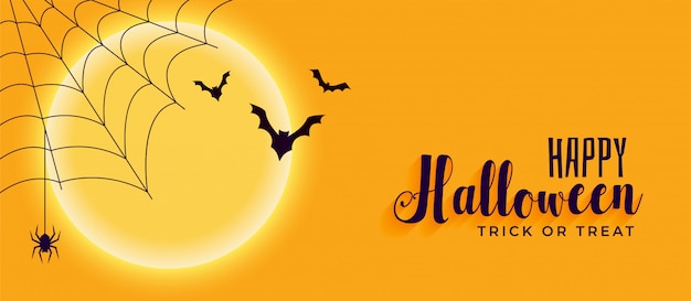Banner de feliz dia das bruxas com teia de aranha e morcegos voando Vetor grátis