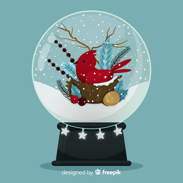 Globo de bola de neve de natal de design plano com pássaro Vetor grátis